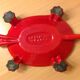 Turtle pocket emptier in enameled red cast iron by Castirone France