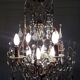 Louis XV-style bronze cage and crystal Baccarat chandelier