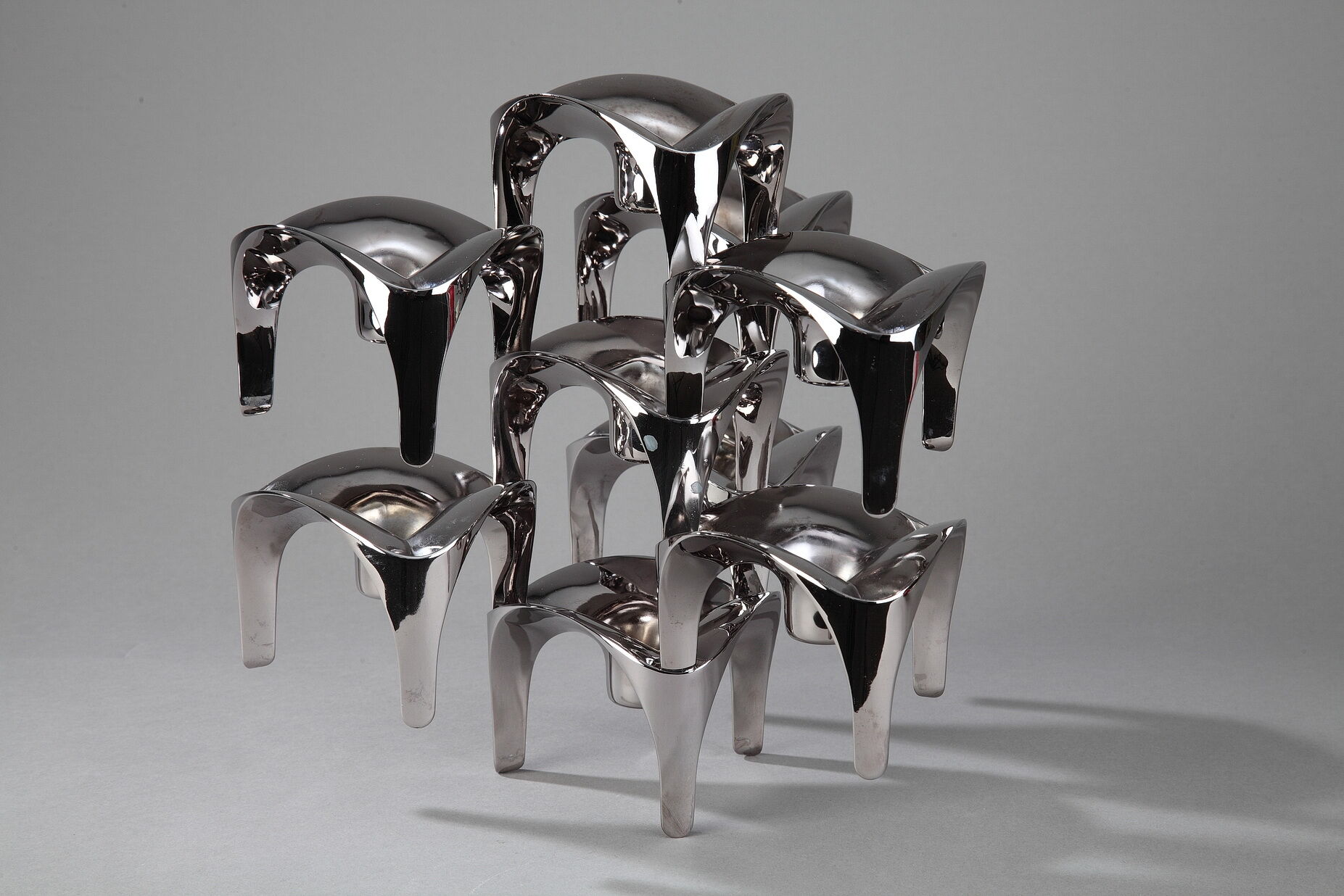 Set of 9 modular candle holders in chromed metal, nagel germany