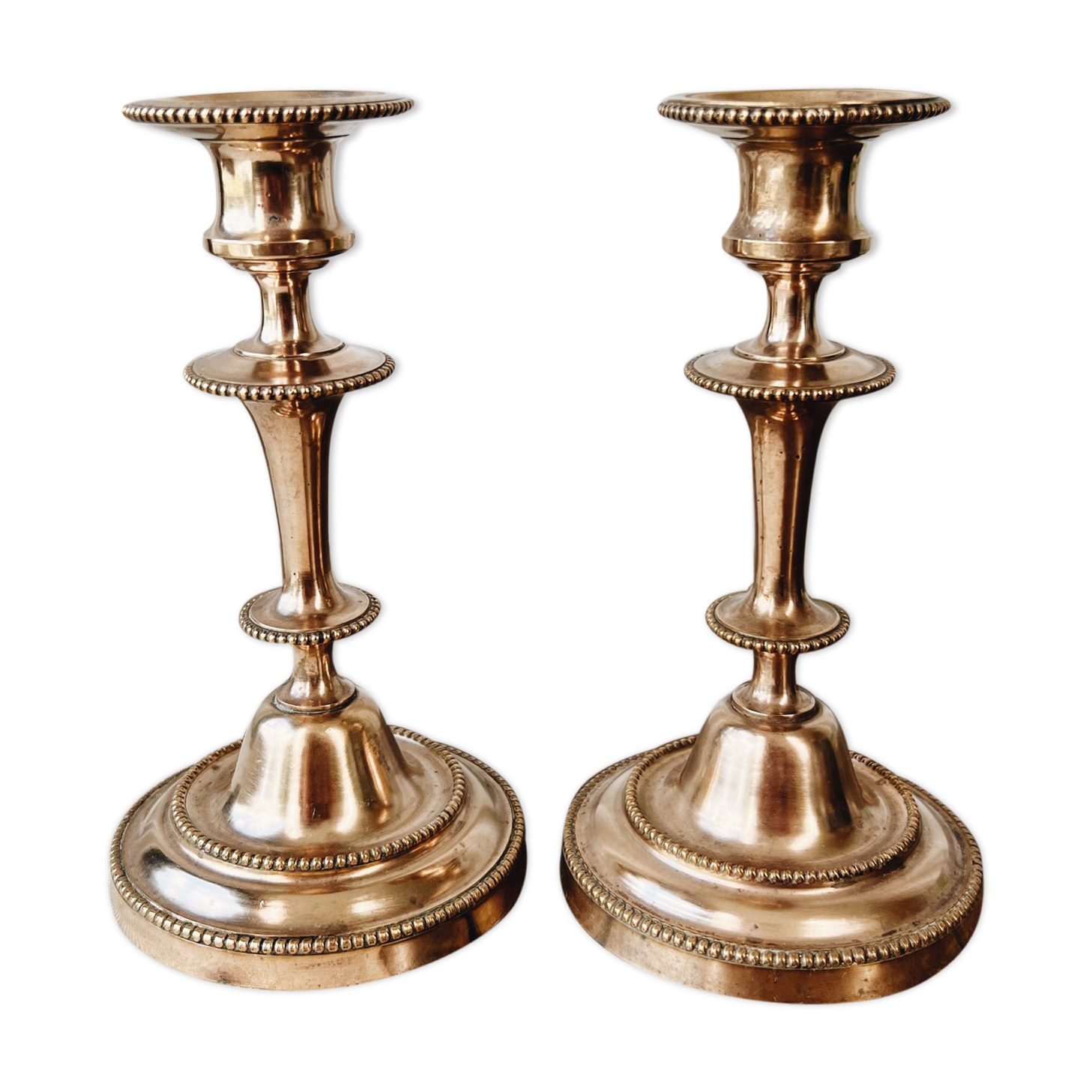 Duo of brass candle holders