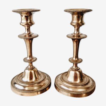 Duo of brass candle holders