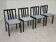 Set of 4 modernist black chairs with light blue ribbed fabric