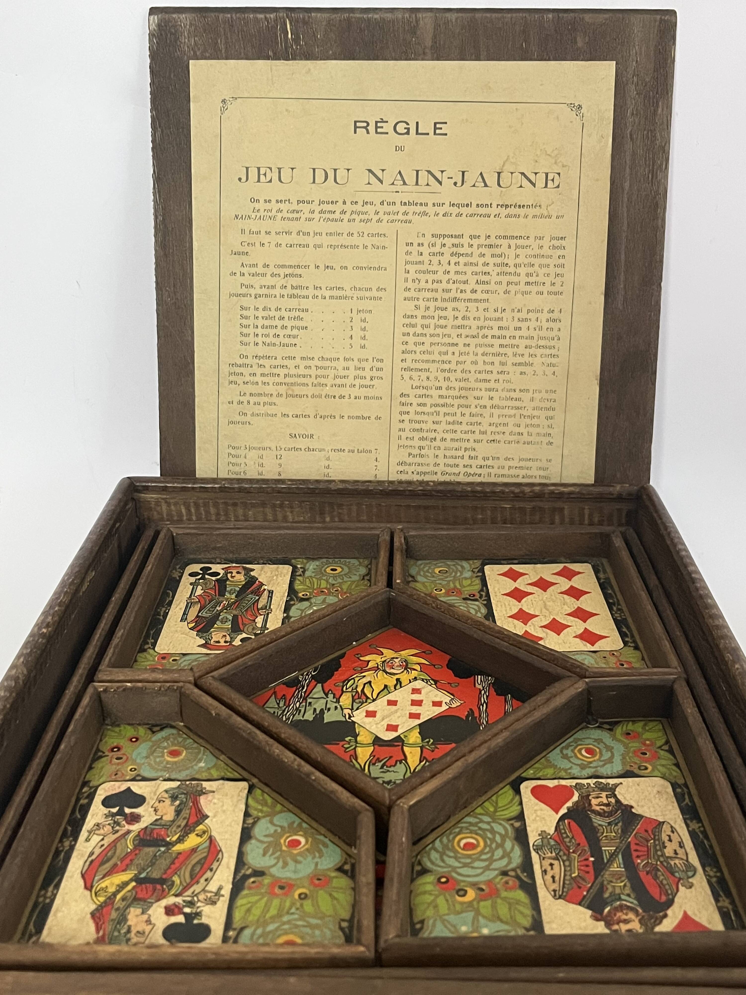 Old game of nain jaune with its bone tokens.