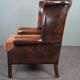 Chesterfield armchair with armrests
