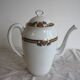 Antique coffee pot in white Limoges porcelain with floral motifs