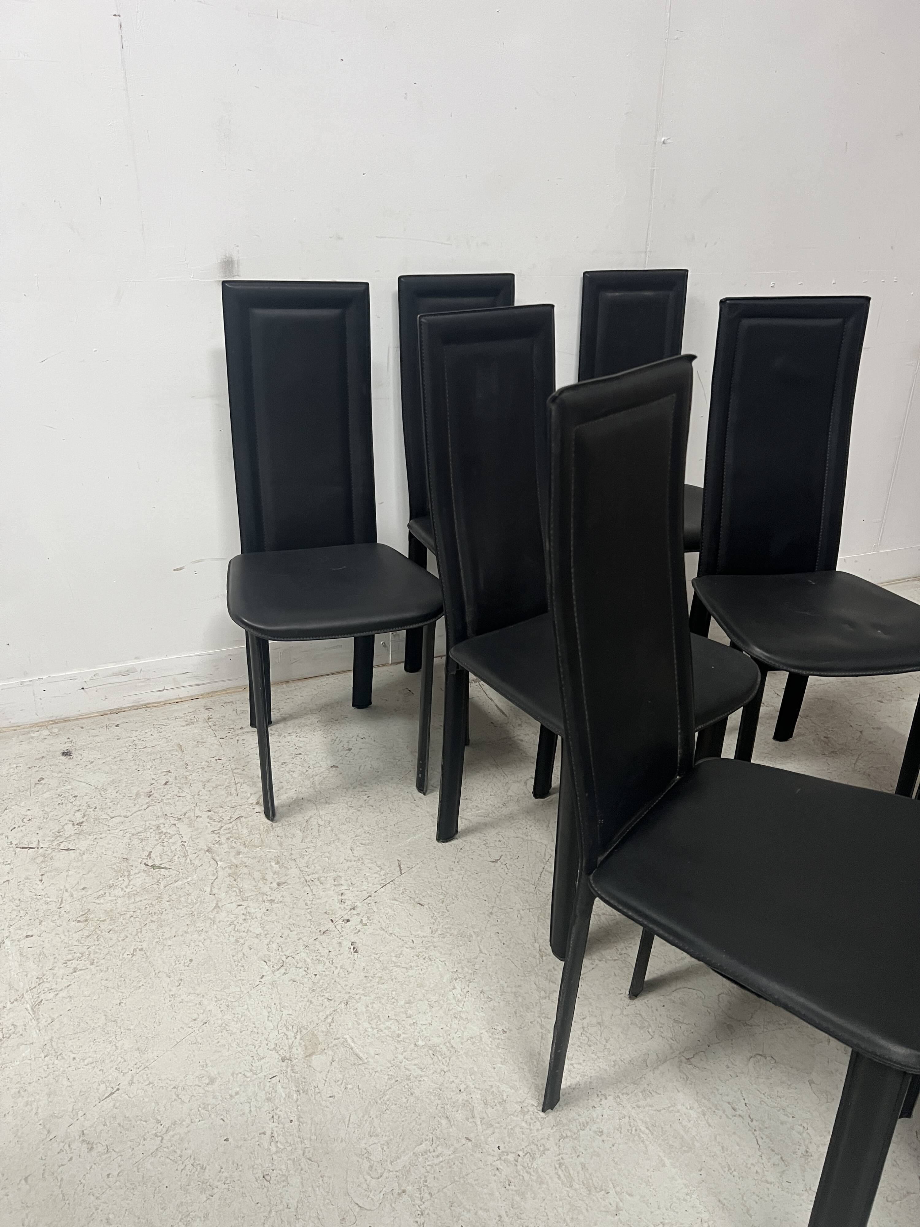 Set of eight designer chairs in black leather from the 20th century