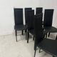 Set of eight designer chairs in black leather from the 20th century