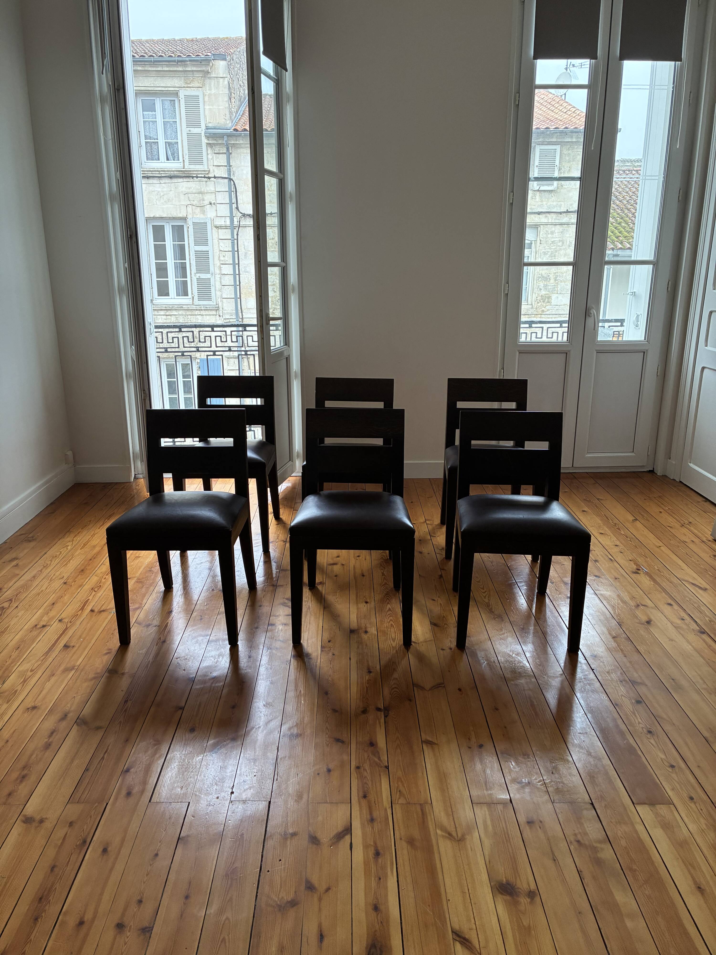 6 Christian Liaigre dining room armchairs