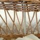 Rattan and wrought iron cradle