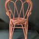 Vintage pink rattan armchair