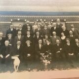 Old photograph of a newlywed couple with a dog