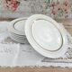 Set of 7 Limoges porcelain dinner plates by A. Vignaud