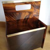 Tortoiseshell lucite magazine rack from the Christian Dior Home collection.