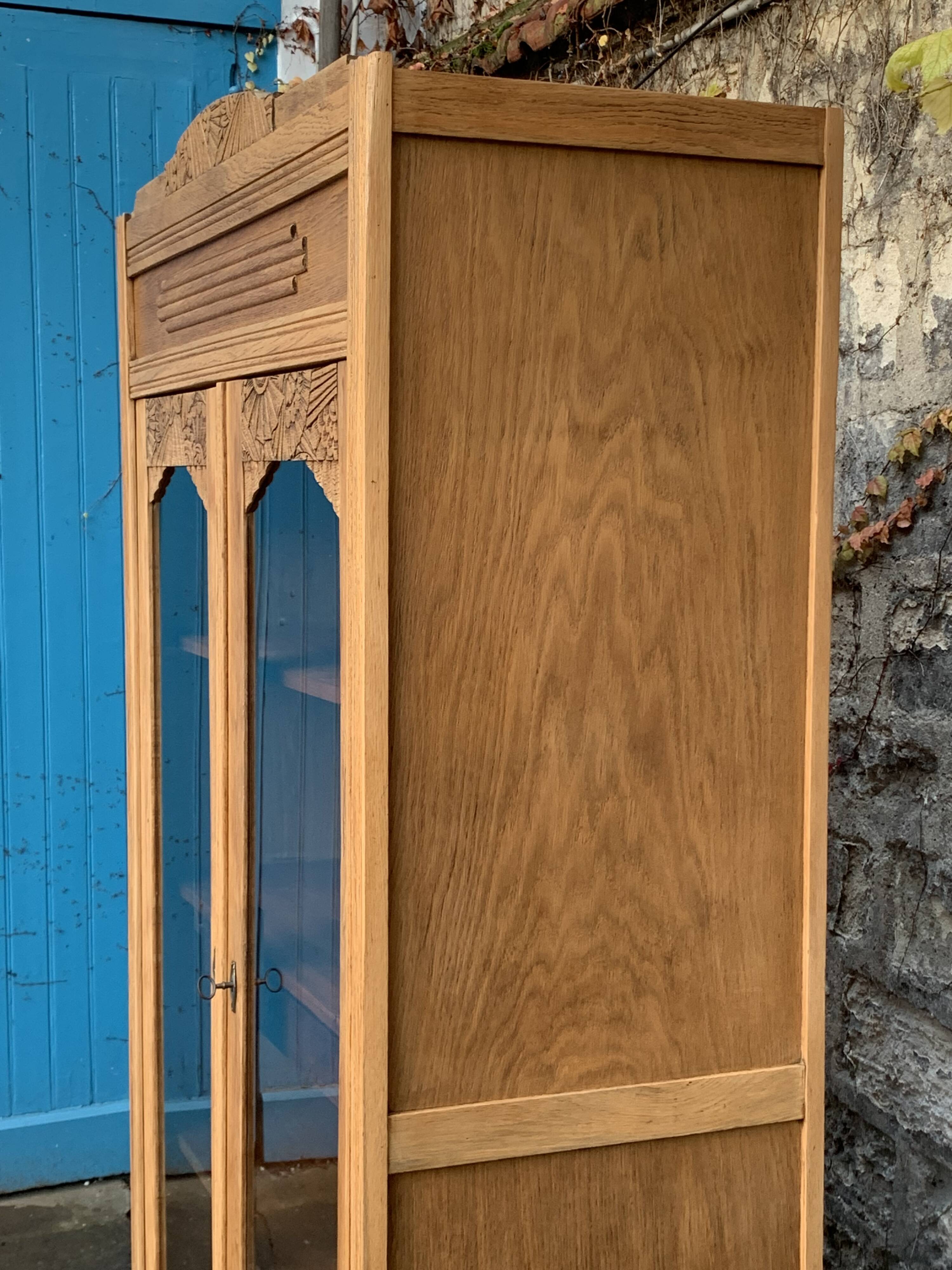 Parisian art deco glass cabinet in raw wood