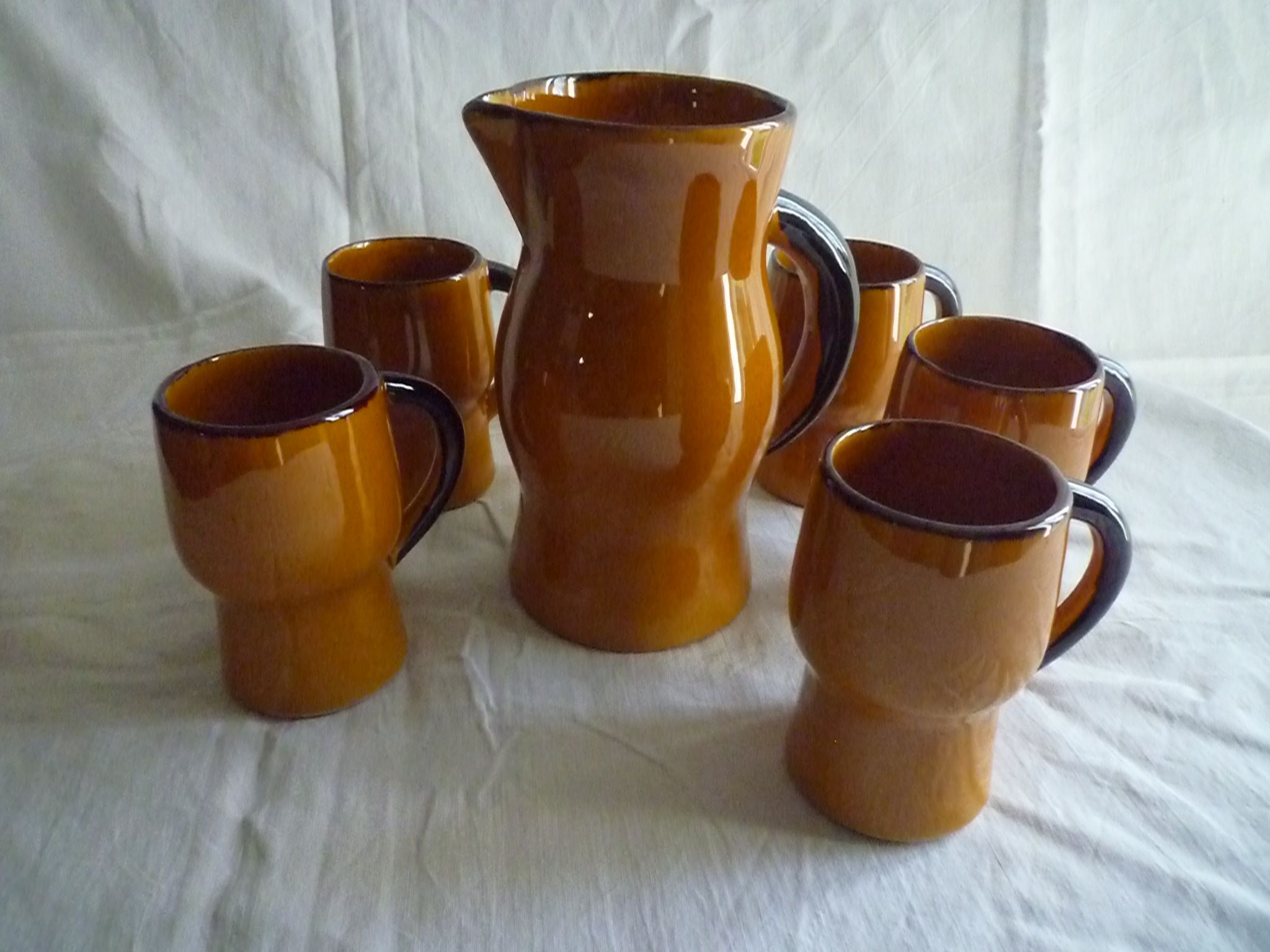 Service to orangeade in glazed earth, 1970s