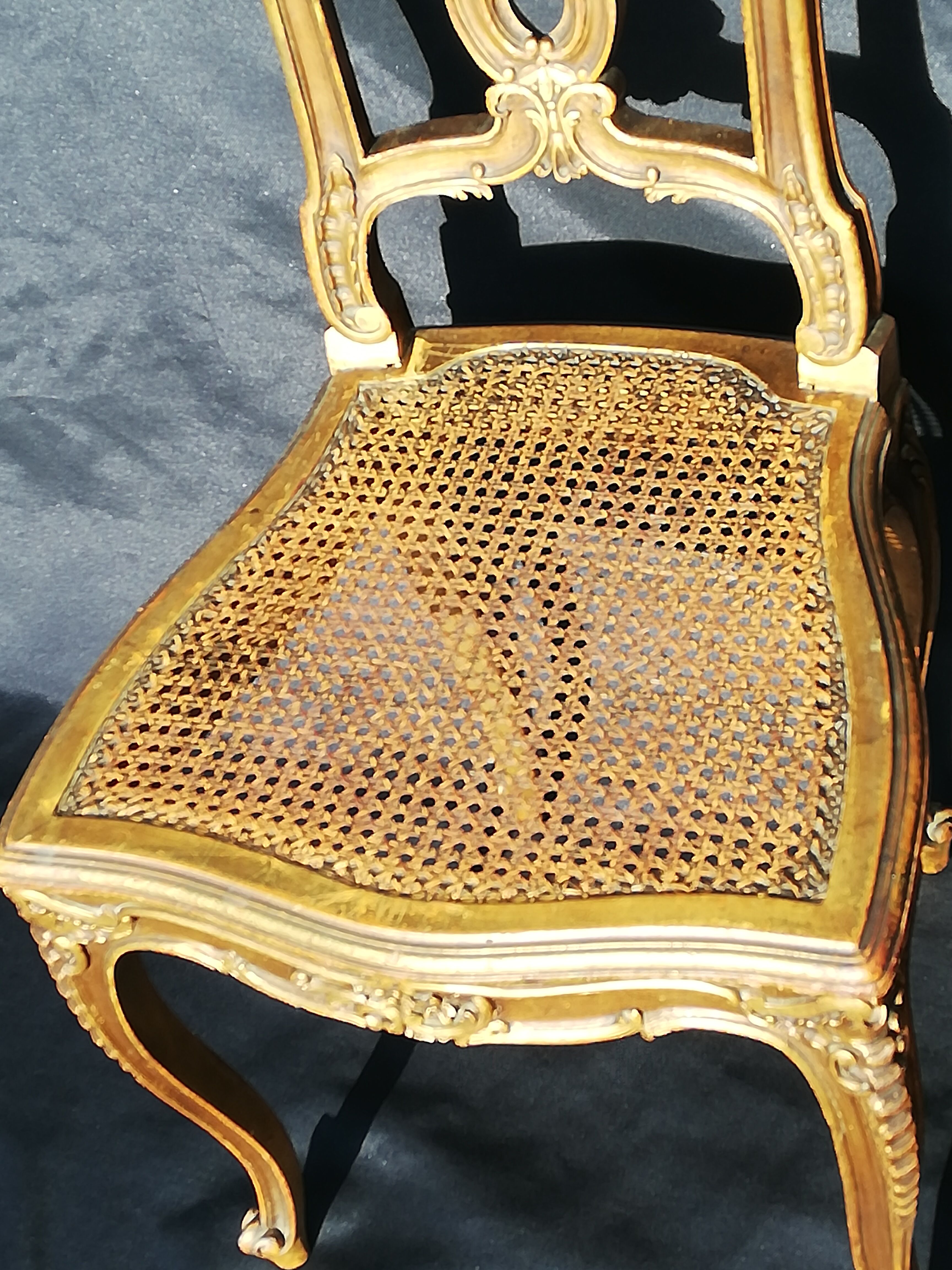 Pair of old canne chairs in gilded wood