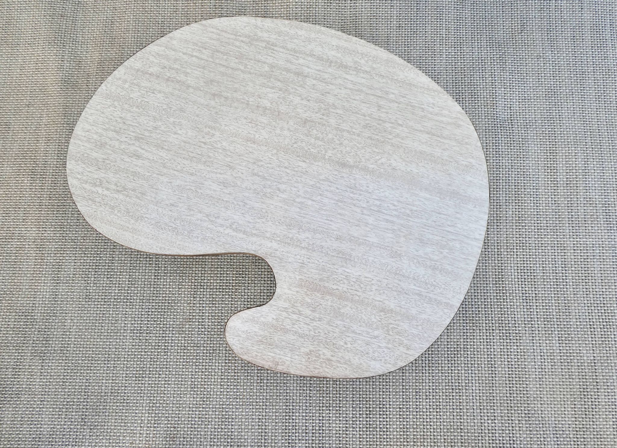 Table basse tripode forme libre, en bois et Formica années 60