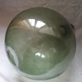 Old blown glass demijohn