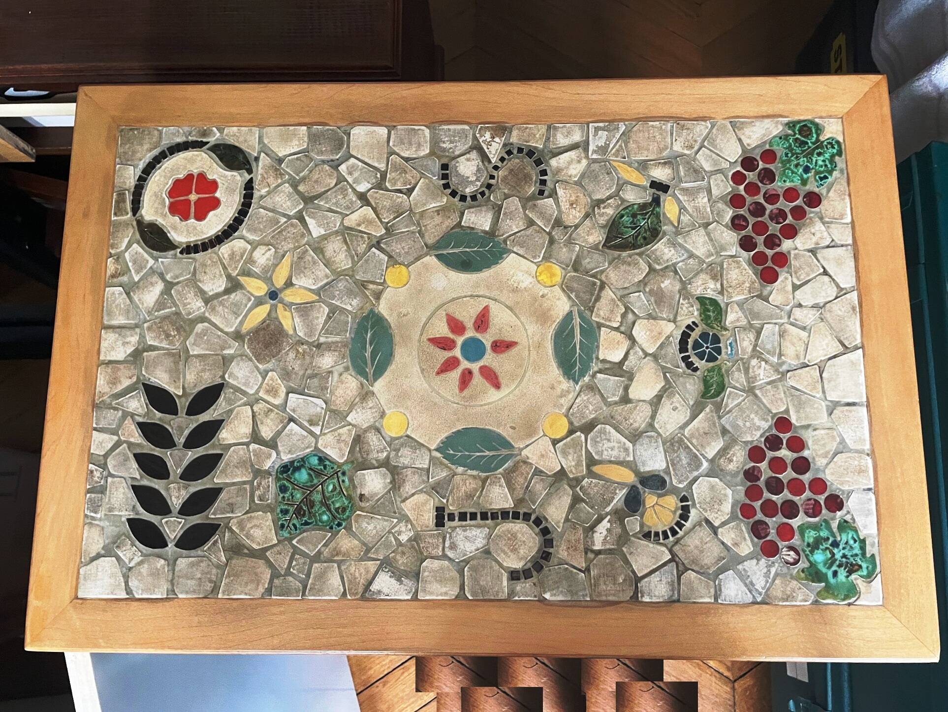 New oak storage furniture with a signed artisanal mosaic top.