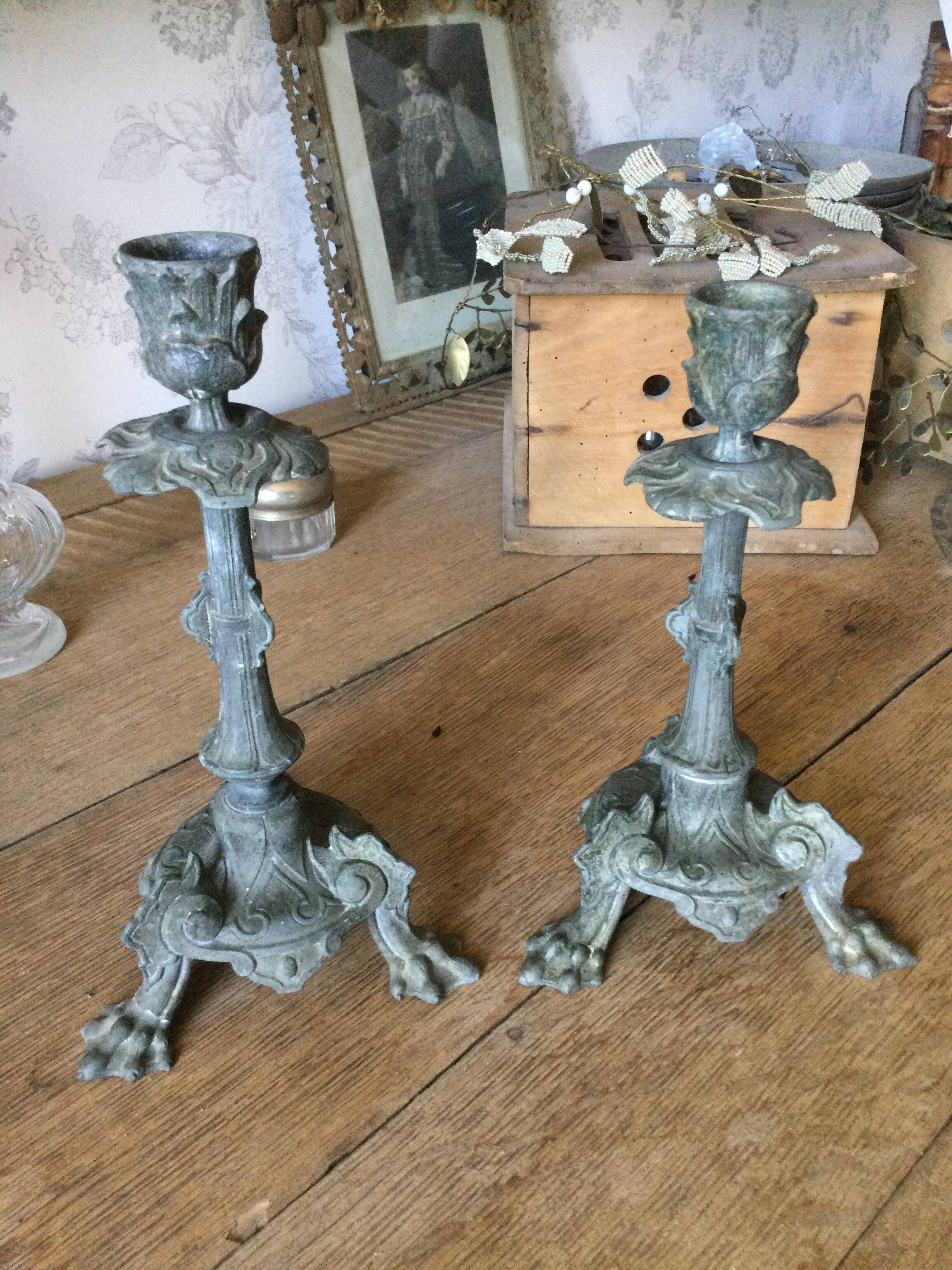 Set of 2 antique candlesticks in spelter.