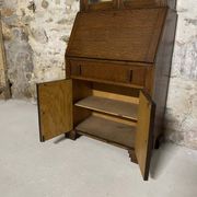 Oak display secretary cabinet with drop-down front, two sections.