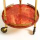 Round, small 1960s Aldo Tura serving or bar trolley in red goatskin leather