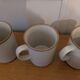 Six ceramic mugs