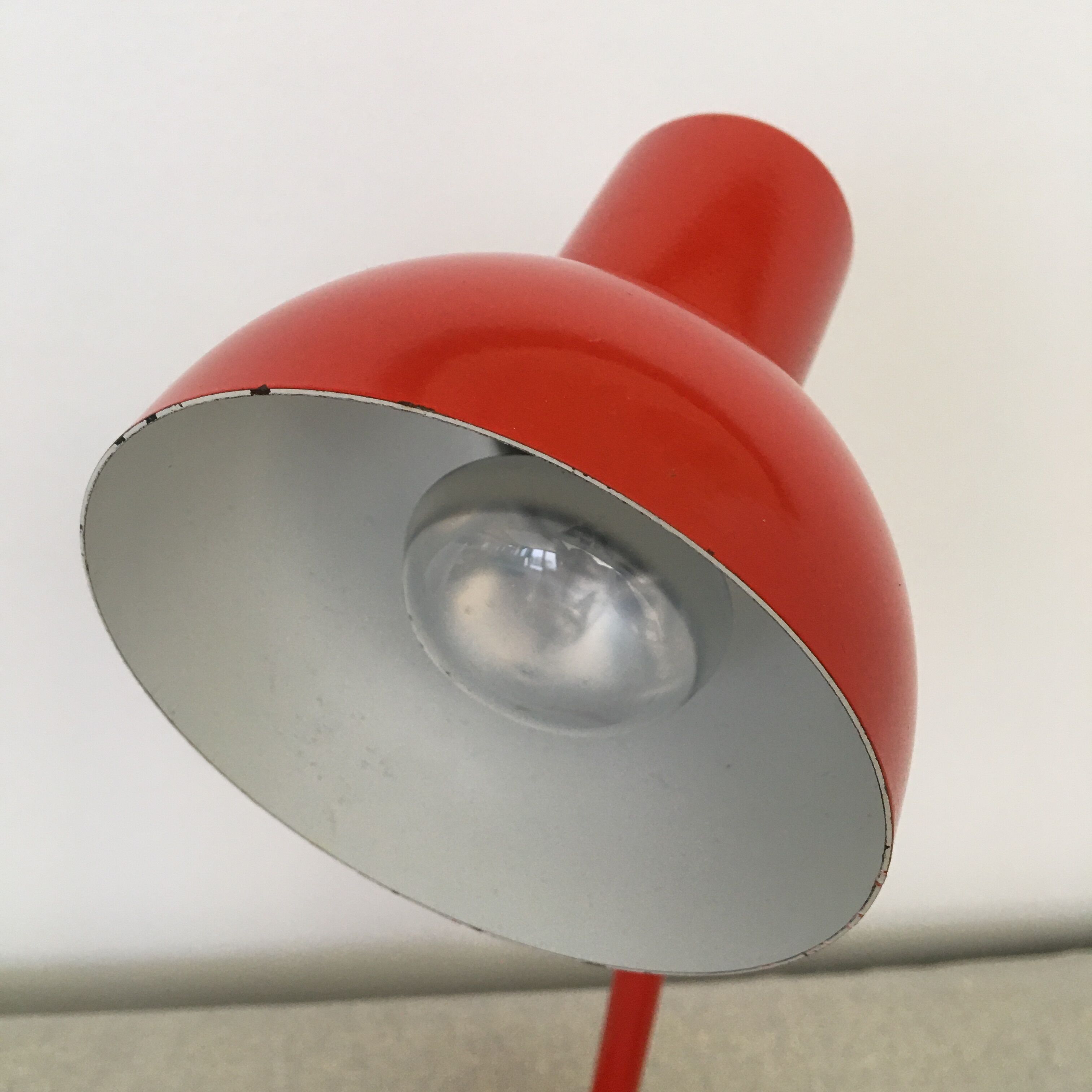 Flexible red desk lamp