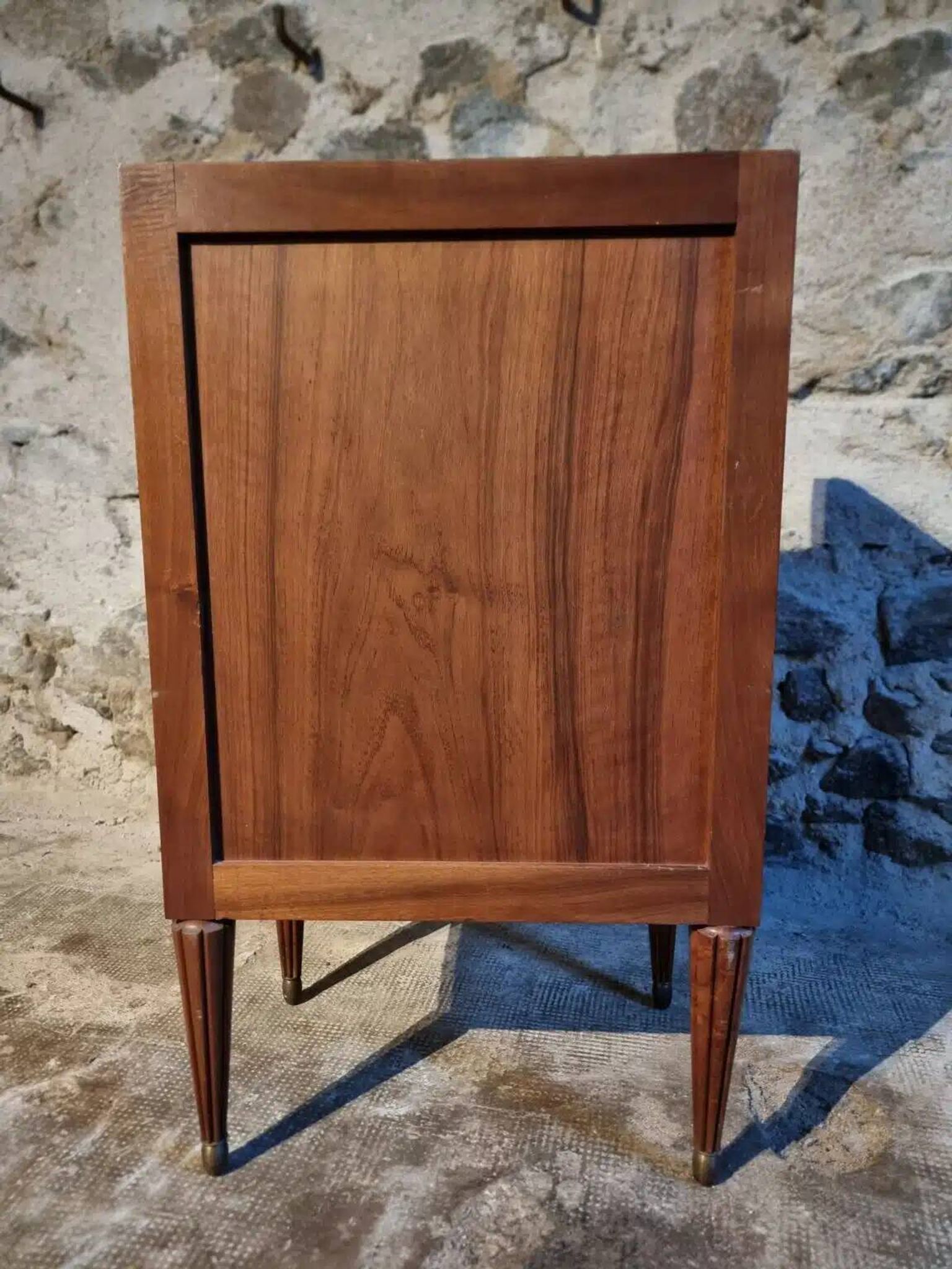 French antique bedside table in walnut with a marble top and porcelain interior, early 20th century.