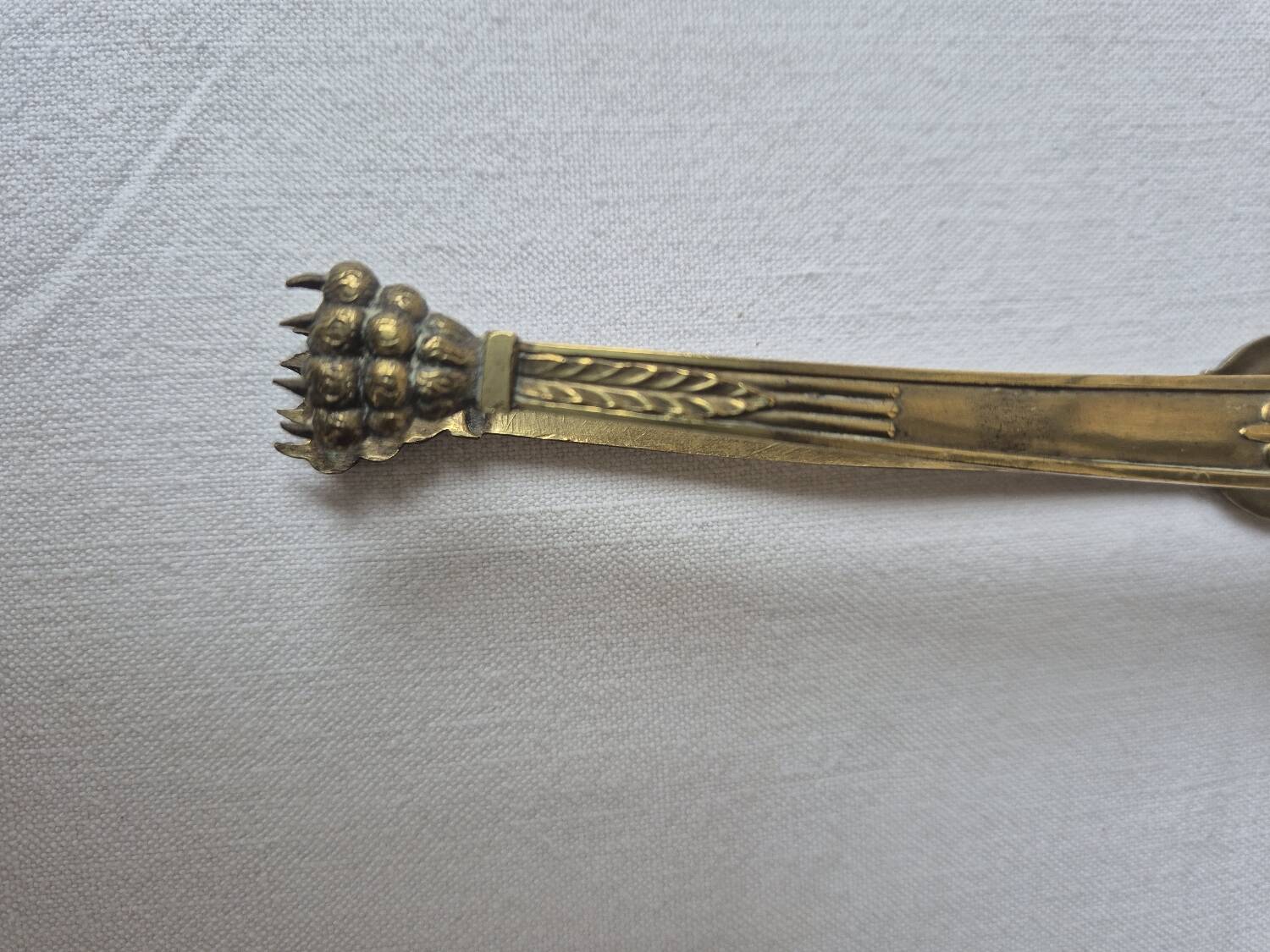 Antique brass sugar tongs