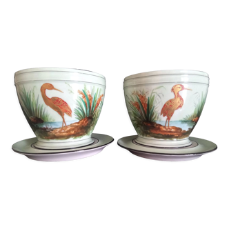 Paire de pots avec sous coupes en porcelaine de Paris, décor oiseaux