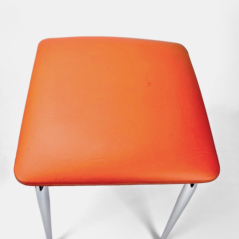 Duo of stools in orange skai and stainless feet