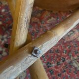 Vintage Mexican tripod stools in bamboo and leather.