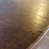 Round wooden table with beaded legs