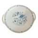Round serving dish with handles (probably a cake dish or a plate)