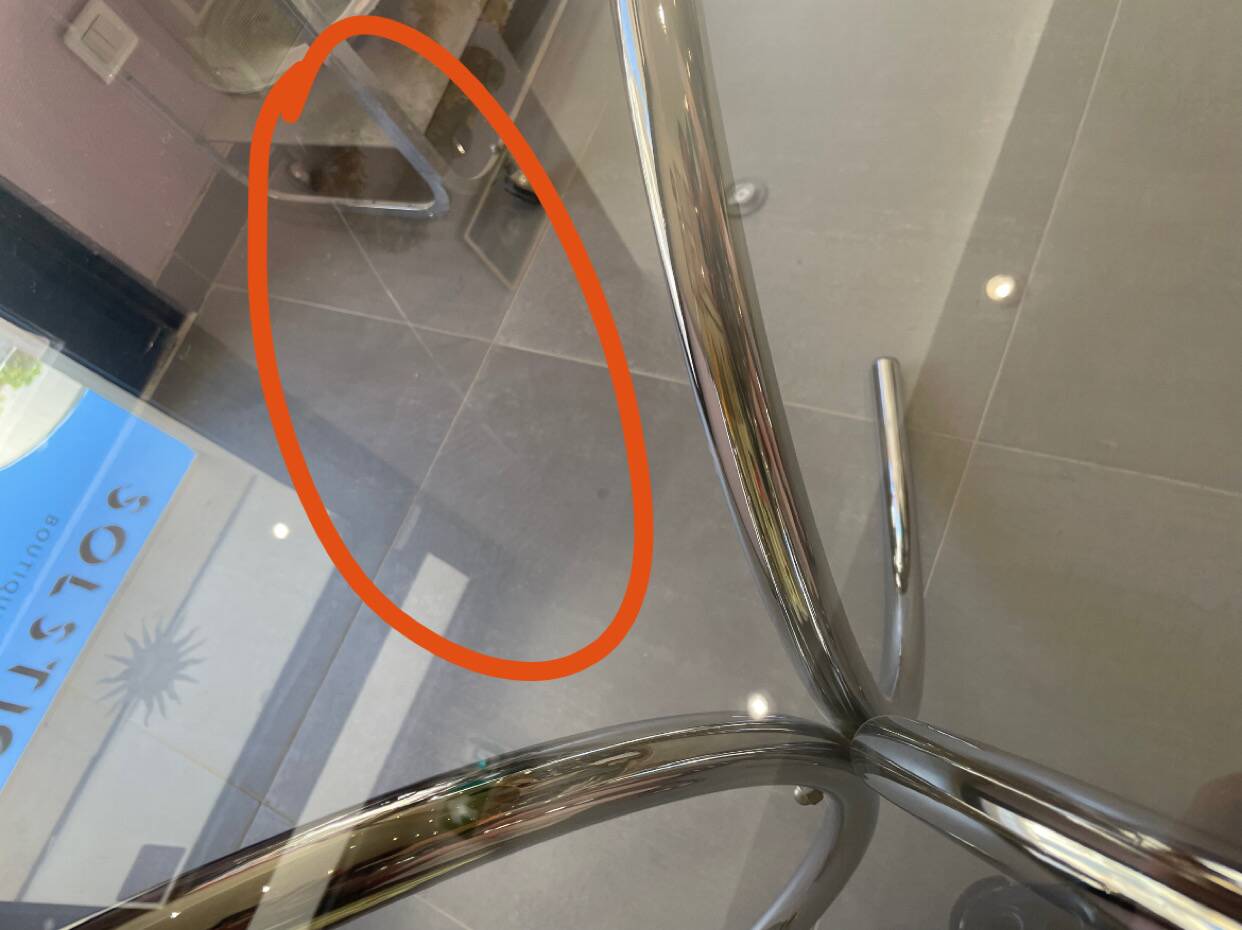 Chromed metal and smoked glass table