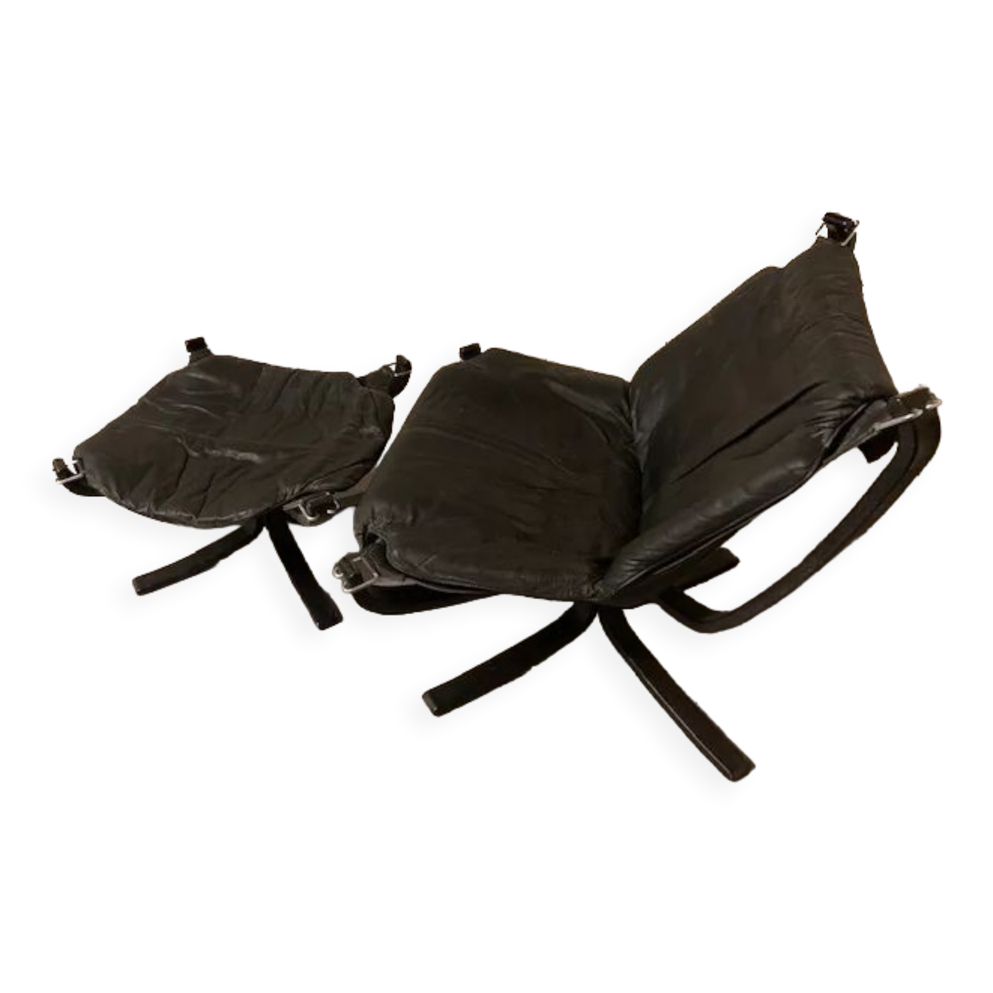 Leather Falcon armchair and footrest