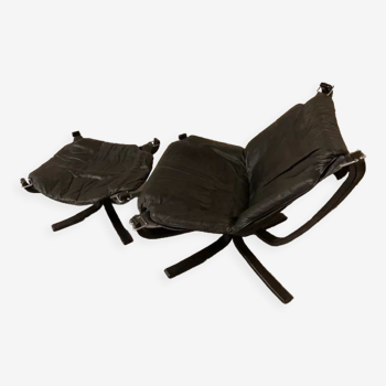 Leather Falcon armchair and footrest