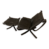 Leather Falcon armchair and footrest