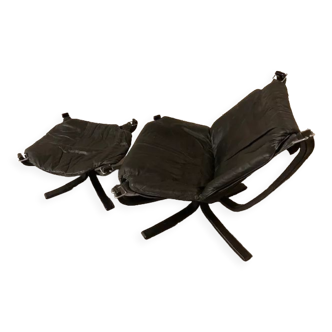 Leather Falcon armchair and footrest