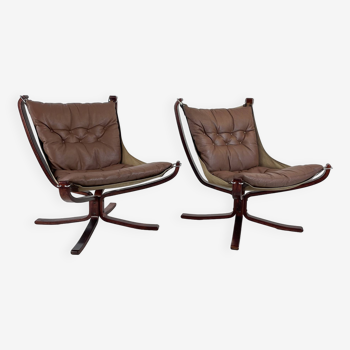 Pair of Vintage light brown leather low backed Falcon chairs designed by Sigurd Resell