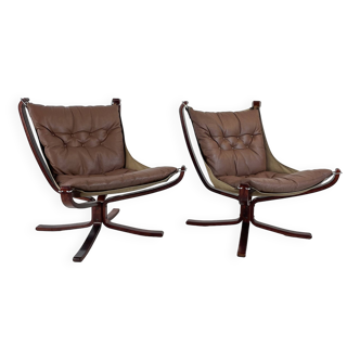 Pair of Vintage light brown leather low backed Falcon chairs designed by Sigurd Resell