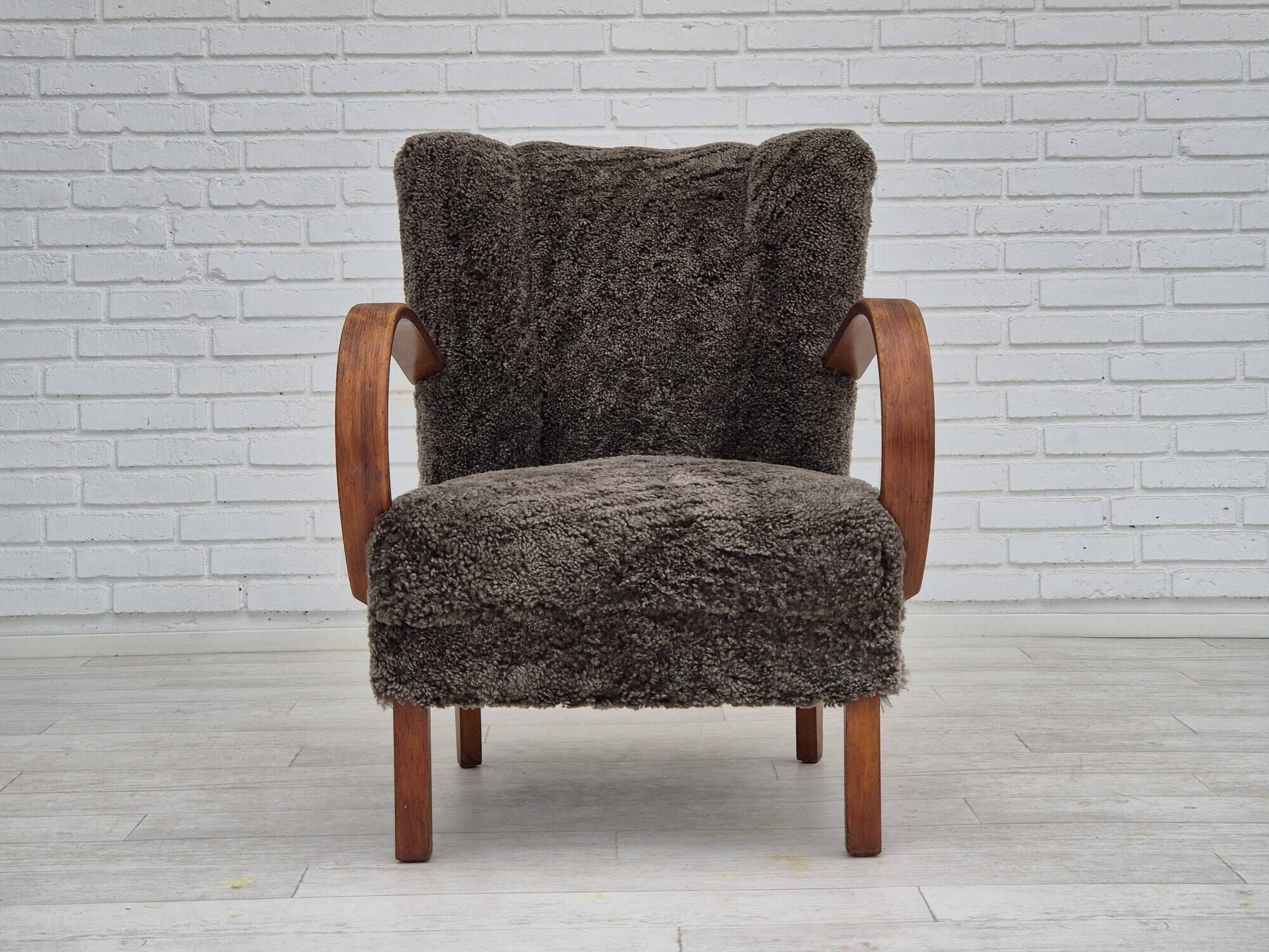 1950s, Danish design, reupholstered armchair, genuine sheepskin "Wellington".