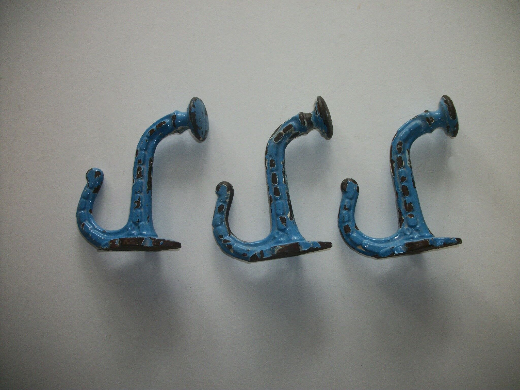 Set of 3 swaddled cast iron hooks