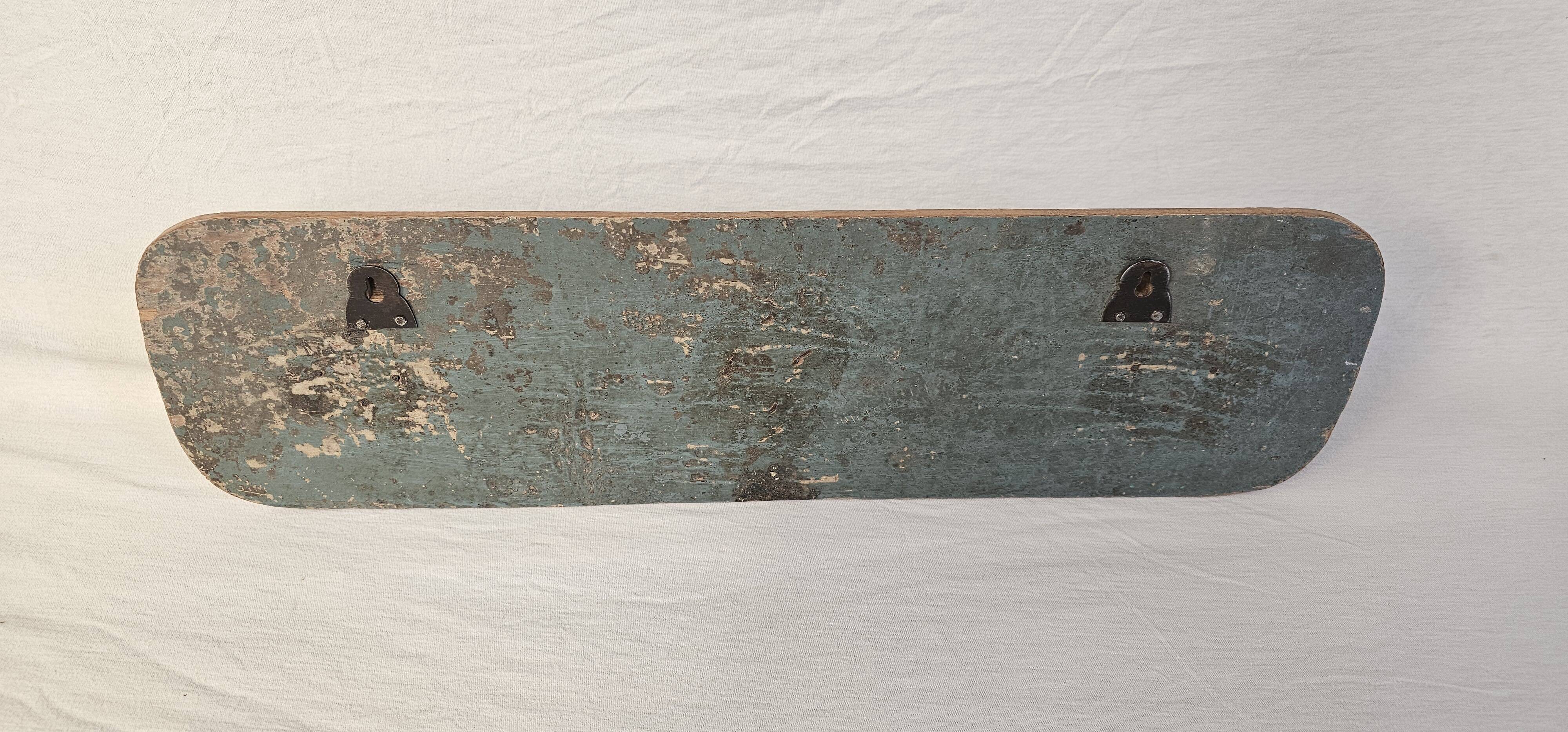 Antique teak coat rack with 3 wrought iron hooks