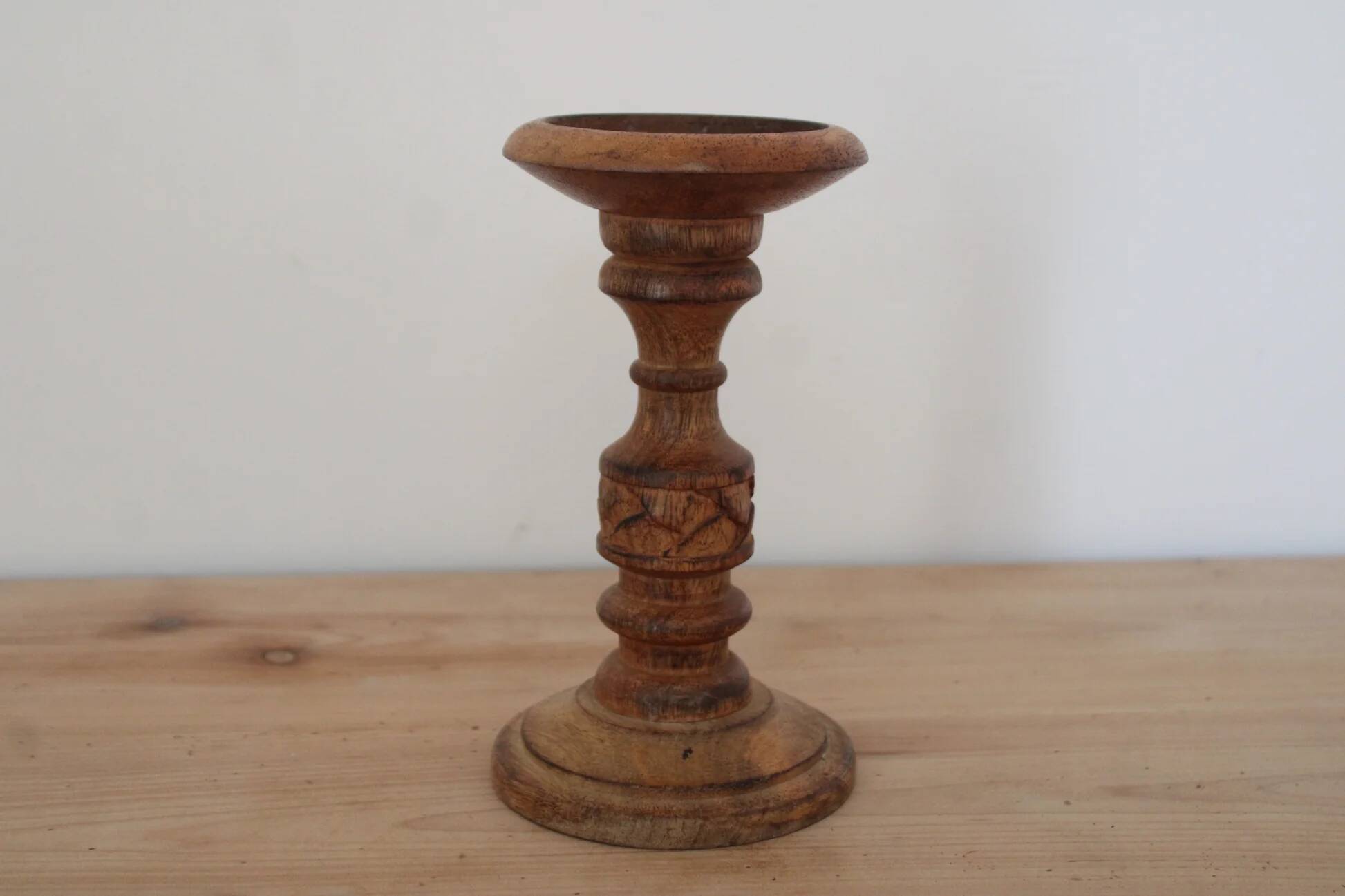 Turned and carved wooden candlestick with foliage decoration – H 20 cm