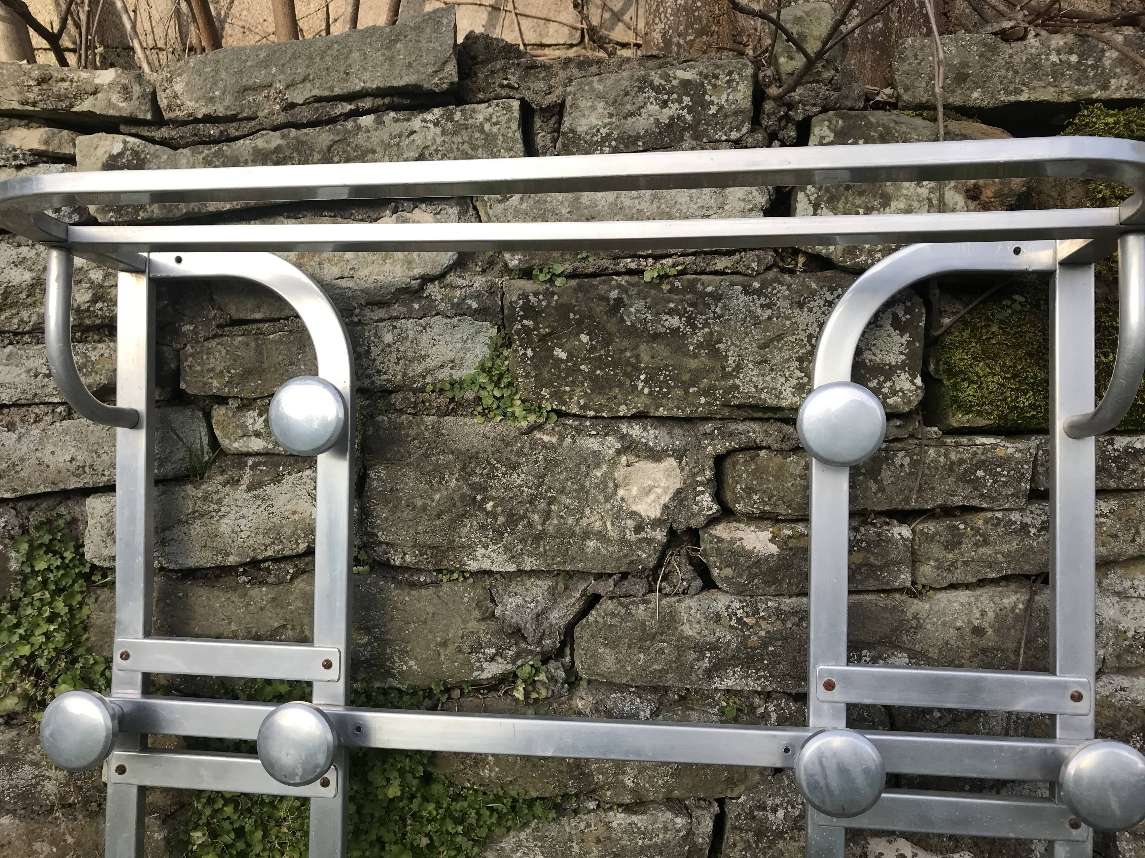 Vintage aluminum coat holder