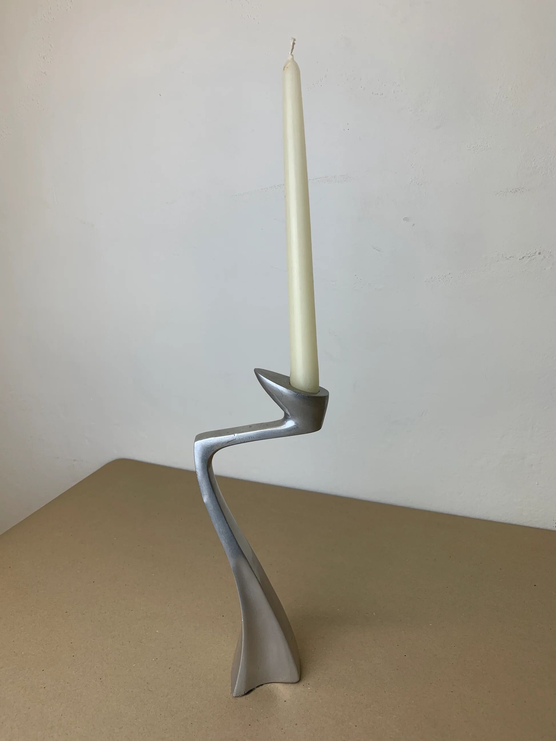 Swan candlestick by Matthew Hilton, solid aluminium, England, 1980s