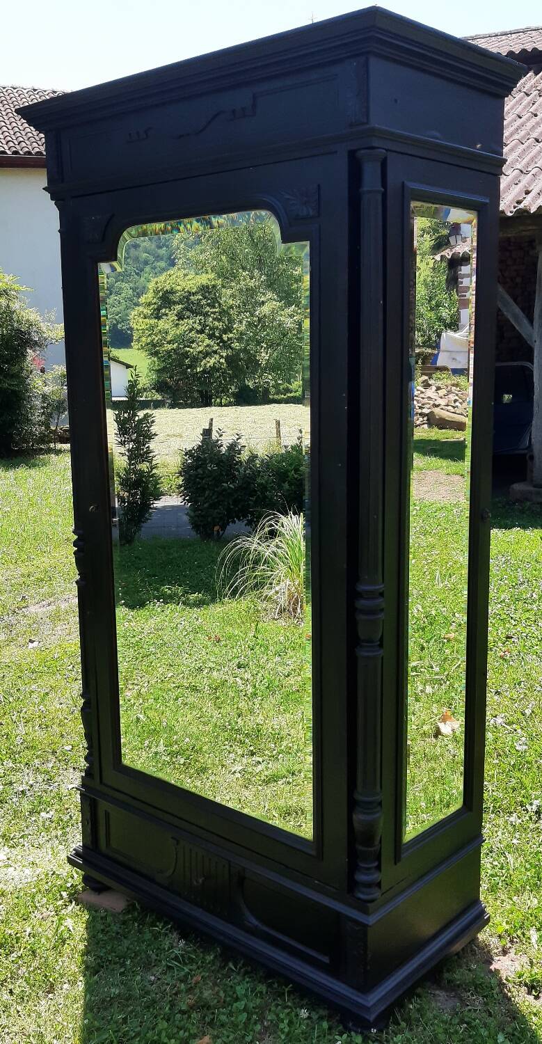 Dressmaker's cabinet with beveled triptych mirrors. (Mirror cabinet)