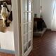 Triptych glass door with three panels featuring small panes. Vintage.
